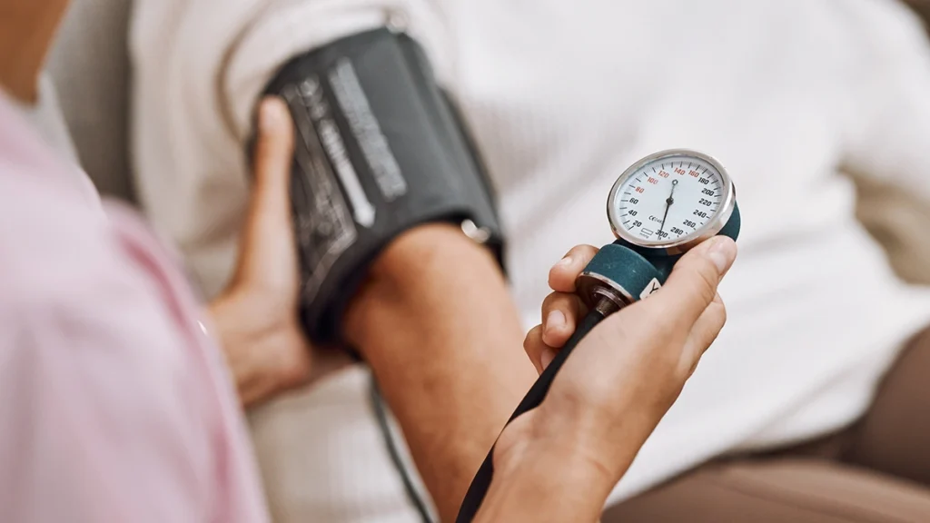 Blood pressure check before dental implant treatment