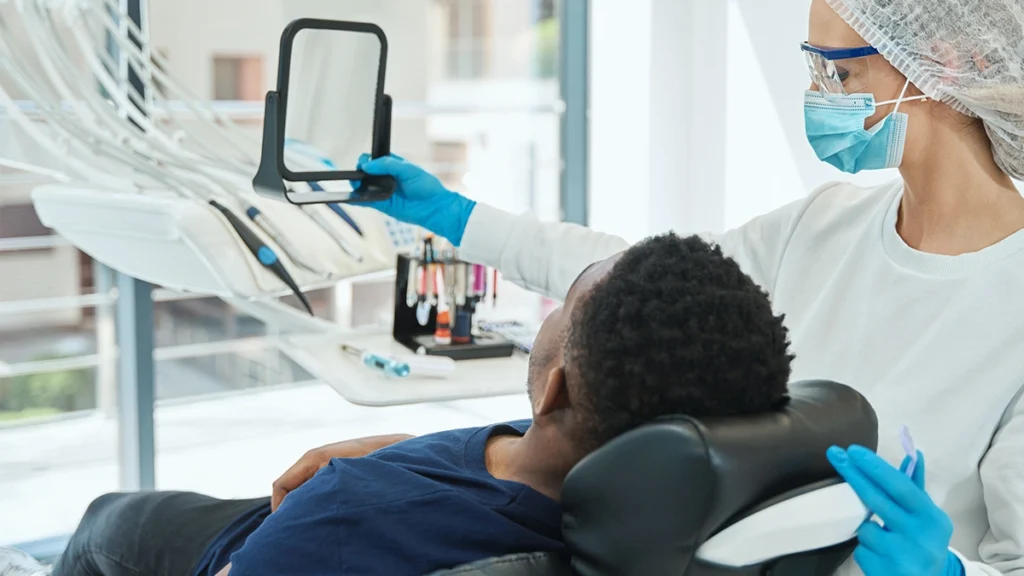 Dentist evaluating a patient before dental implant surgery in a dental clinic