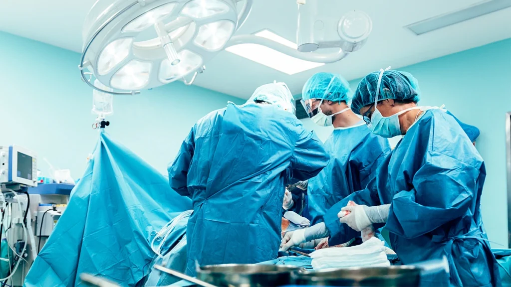 Cardiac surgery team operating before dental implant treatment planning