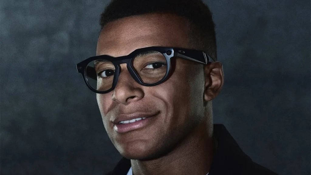 Kylian Mbappé wearing glasses in a portrait focused on confidence and public image