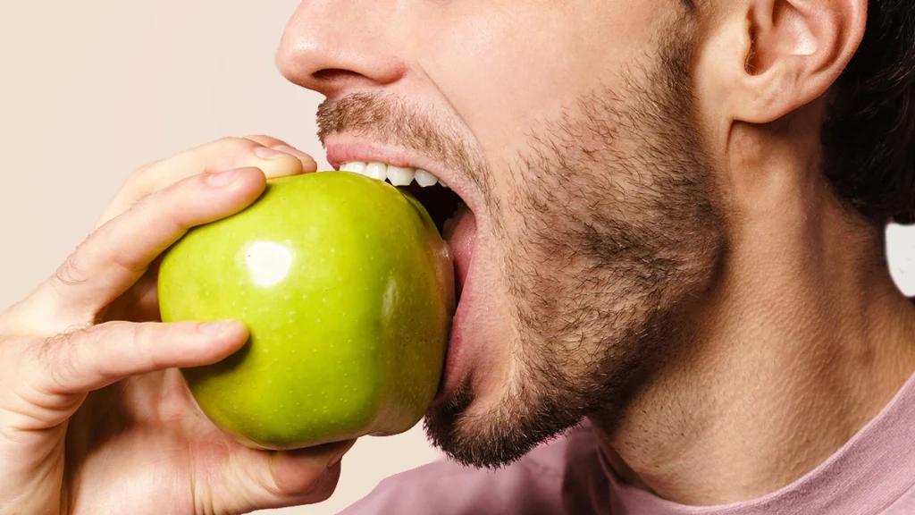 Dental implants help TMJ symptoms by improving chewing and bite balance