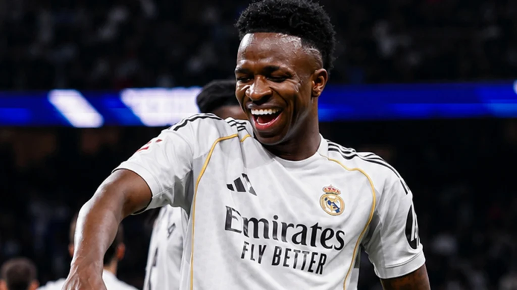 Vinícius Jr smiling during football match for dental health article