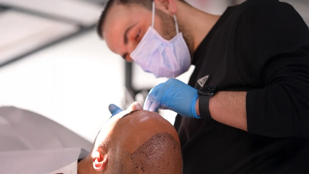 Dentist examining a patient during Invisalign treatment in Turkey